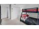 bedroom showcasing bunkbeds and Disney themed decor at 1578 Slice Way, Davenport, FL 33896
