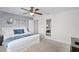 Comfortable bedroom with carpet flooring, and a calming color palette at 1578 Slice Way, Davenport, FL 33896