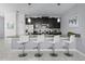 Modern kitchen featuring granite countertops, stainless steel appliances, and pendant lighting at 1578 Slice Way, Davenport, FL 33896