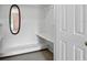 Walk-in closet boasts white wire shelving and a full-length mirror for checking outfits at 16 Pine Forest Dr, Haines City, FL 33844