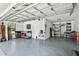 Spacious garage with painted floor and walls, and ample storage space at 16 Pine Forest Dr, Haines City, FL 33844