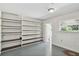 Bright room with custom built-ins and a large window at 16 Pine Forest Dr, Haines City, FL 33844