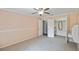 Walk-in closet with carpet, storage shelves, and a mirror for added convenience at 16 Pine Forest Dr, Haines City, FL 33844
