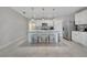 Modern kitchen with an island, sleek stainless appliances, and a stylish backsplash at 1600 Spray Ter, St Cloud, FL 34771