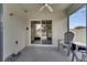 Covered patio with ceiling fan, concrete floors, outdoor seating, and sliding glass door at 1600 Spray Ter, St Cloud, FL 34771