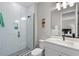 Bathroom featuring a glass-enclosed shower, and vanity at 16049 Volterra Pt, Bella Collina, FL 34756