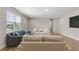 Living room featuring hardwood floors, neutral-colored walls, and three sofas at 16049 Volterra Pt, Bella Collina, FL 34756