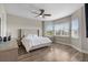 Bright main bedroom suite with luxury vinyl floors and plenty of natural light at 16049 Volterra Pt, Bella Collina, FL 34756