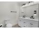 Modern bathroom with double vanity, sleek fixtures, and ample counter space at 2211 Simmons St, Leesburg, FL 34748