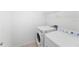 Clean laundry room with a washing machine and dryer at 2461 Bulrush Dr, St Cloud, FL 34769