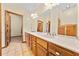 This bathroom features a very long vanity with double sinks and plenty of storage at 2471 Jenscot Rd, St Cloud, FL 34771