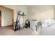 Laundry room with washer, dryer, storage shelving, and linoleum flooring at 2471 Jenscot Rd, St Cloud, FL 34771