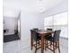 Inviting dining area with natural light featuring an entertainment area and pool table at 2503 Calla Lily Cv, Kissimmee, FL 34758