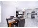 Cozy dining area with kitchen views featuring an open concept floor plan at 2503 Calla Lily Cv, Kissimmee, FL 34758