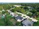 Aerial view of a neighborhood showing single-Gathering homes, mature trees, and local streets at 2629 Williston Dr, Lakeland, FL 33801