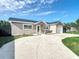 Charming single-story home with a well-manicured front yard and a welcoming entrance at 2629 Williston Dr, Lakeland, FL 33801