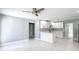 Open concept living room showcasing new flooring and modern fixtures at 2629 Williston Dr, Lakeland, FL 33801