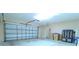 Spacious garage with an automatic door opener and ample storage space at 2722 Corybrooke Ln, Kissimmee, FL 34744