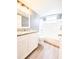 Clean bathroom with granite vanity, updated fixtures, and shower-tub combination at 2735 N Poinciana Blvd # 95, Kissimmee, FL 34746