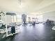 Well-equipped gym features a variety of exercise machines and ample natural light at 2735 N Poinciana Blvd # 95, Kissimmee, FL 34746