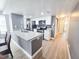 Bright kitchen with stainless steel appliances, granite countertops, and modern white cabinetry at 2735 N Poinciana Blvd # 95, Kissimmee, FL 34746