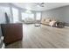 Spacious living room featuring neutral tones, large windows, and modern furnishings at 2735 N Poinciana Blvd # 95, Kissimmee, FL 34746