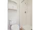 Bathroom featuring a walk-in shower, tiled floor, and modern vanity with storage and a cabinet at 3038 Elbib, St Cloud, FL 34769