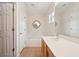 Relaxing bathroom with a tub, tiled floor, and modern vanity with ample storage space at 3038 Elbib, St Cloud, FL 34769