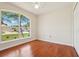 Bedroom featuring hardwood floors, bright window, and lots of natural light at 3038 Elbib, St Cloud, FL 34769