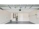 Clean and spacious garage featuring high ceilings and a well-maintained floor at 3038 Elbib, St Cloud, FL 34769