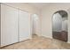 Hallway with a closet and an arched doorway at 3038 Elbib, St Cloud, FL 34769