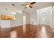 Open-concept living area featuring hardwood floors and a ceiling fan at 3038 Elbib, St Cloud, FL 34769