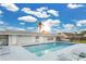 Sparkling community pool with sundeck provides a relaxing and enjoyable outdoor amenity for residents at 3261 Sawgrass Creek Cir, St Cloud, FL 34772