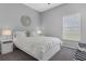 Cozy bedroom features a comfortable bed, stylish furnishings, and ample natural light at 3617 Northwoods Dr, Kissimmee, FL 34746