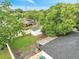 Aerial view of backyard featuring an outbuilding and an enclosed patio area at 3804 Anthony Ln, Orlando, FL 32822