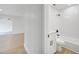 Modern bathroom featuring a white vanity, toilet, and tiled shower with updated fixtures at 3804 Anthony Ln, Orlando, FL 32822