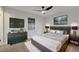 Bedroom is decorated with nice furniture and a television at 3804 Anthony Ln, Orlando, FL 32822