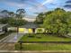 Charming single-story home with lush landscaping, modern driveway, and inviting curb appeal at 3804 Anthony Ln, Orlando, FL 32822