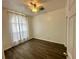 Bedroom with vinyl floors, natural light, and ceiling fan at 453 Alston Dr, Orlando, FL 32835