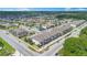 A beautiful aerial view of a well-planned neighborhood with a serene lake and lush greenery at 5103 Jones Rd, St Cloud, FL 34771