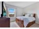 This modern bedroom features ample natural light and a serene atmosphere at 5103 Jones Rd, St Cloud, FL 34771
