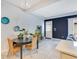 Open-concept dining area with modern lighting and stylish decor at 5103 Jones Rd, St Cloud, FL 34771