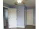 Bedroom features neutral paint, hardwood floors and a ceiling fan at 5144 Picadilly Circus Ct # 2, Orlando, FL 32839