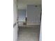 Inviting entryway featuring tile flooring and soothing blue-grey wall paint leading to the living space at 5144 Picadilly Circus Ct # 2, Orlando, FL 32839