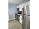 Updated kitchen featuring stainless steel appliances, sleek countertops, and modern cabinetry at 5144 Picadilly Circus Ct # 2, Orlando, FL 32839