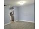 Inviting living space with tile flooring, fresh paint, and an open view to the kitchen area at 5144 Picadilly Circus Ct # 2, Orlando, FL 32839