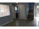 Open living room with neutral paint, tile flooring, and staircase, creating a bright and airy atmosphere at 5144 Picadilly Circus Ct # 2, Orlando, FL 32839