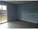 Bright living space with tile flooring and sliding glass door with access to the yard/outdoor area at 5144 Picadilly Circus Ct # 2, Orlando, FL 32839