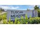 Landscaped entrance sign to Tuscan Meadows community at 5225 Tuscany Ln, Davenport, FL 33897