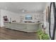 Inviting living room showcasing contemporary design, recessed lighting, and comfortable seating arrangement at 5225 Tuscany Ln, Davenport, FL 33897